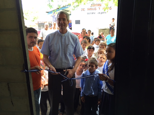 Cutting the ribbon on the new kitchen, built with donations from Messiah Lutheran Church in coordination with Lunches for Learning.